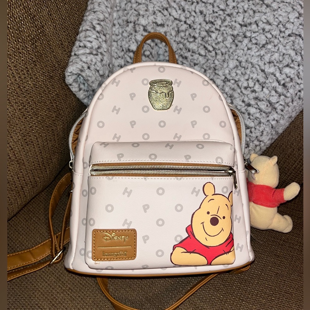 Disney Loungefly Winnie the Pooh back pack.
